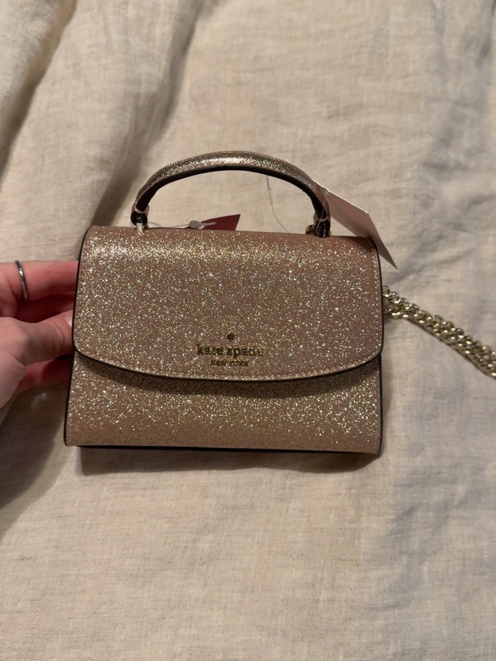 kate spade glitter mini top-handle crossbody in rose gold sparkle